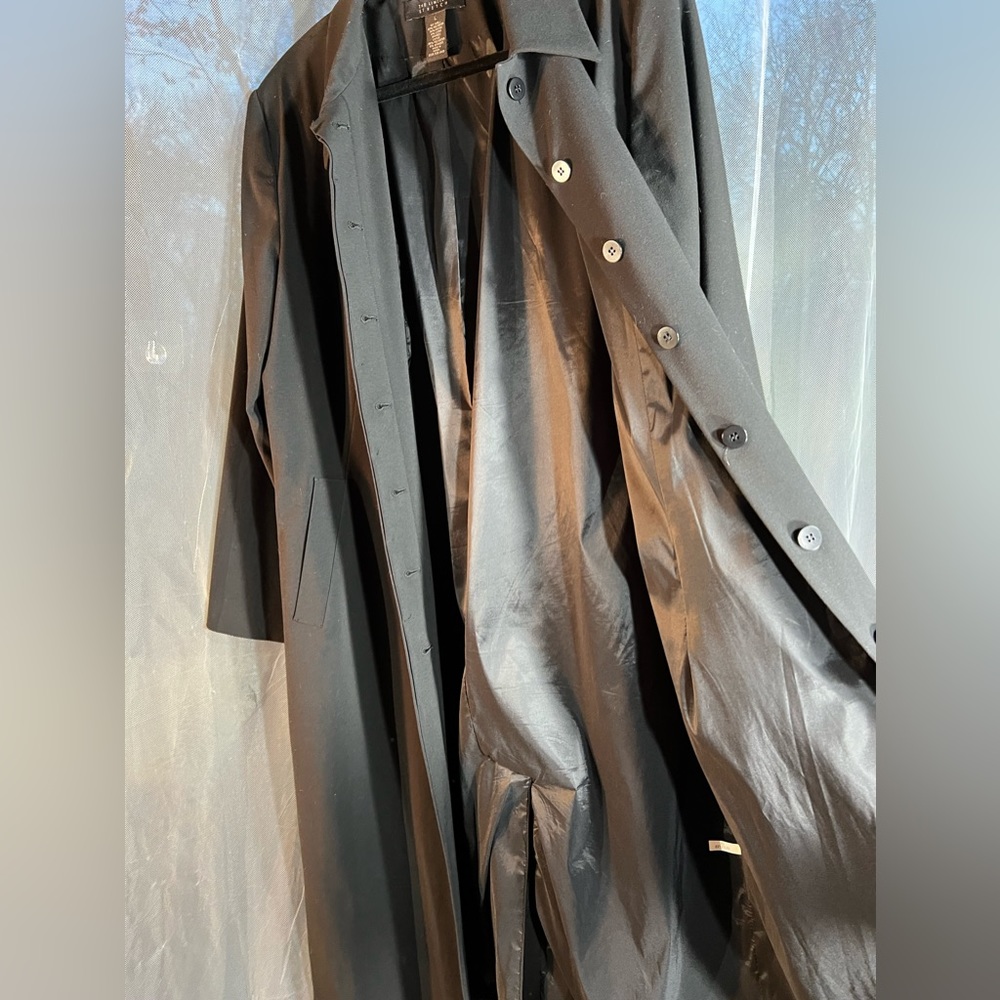 Limited black coat in perfect condition. Good quality material. Comfortable L